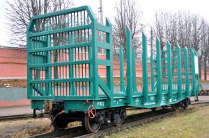 ВАГОН ПЛАТФОРМА ДЛЯ ПЕРЕВОЗКИ ЛЕСОМАТЕРИАЛОВ И КОНТЕЙНЕРОВ МОДЕЛИ 13-9924-01